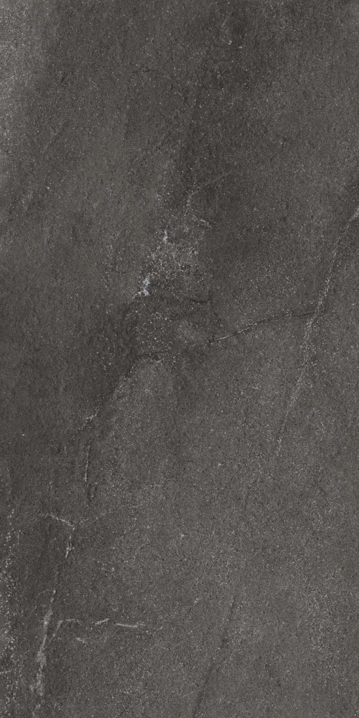 Anthrazitfarbene Fliese in Schieferoptik.