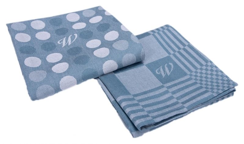 Porcelaingres Fliesen: graue Strukturfliese und glatte Fliese.