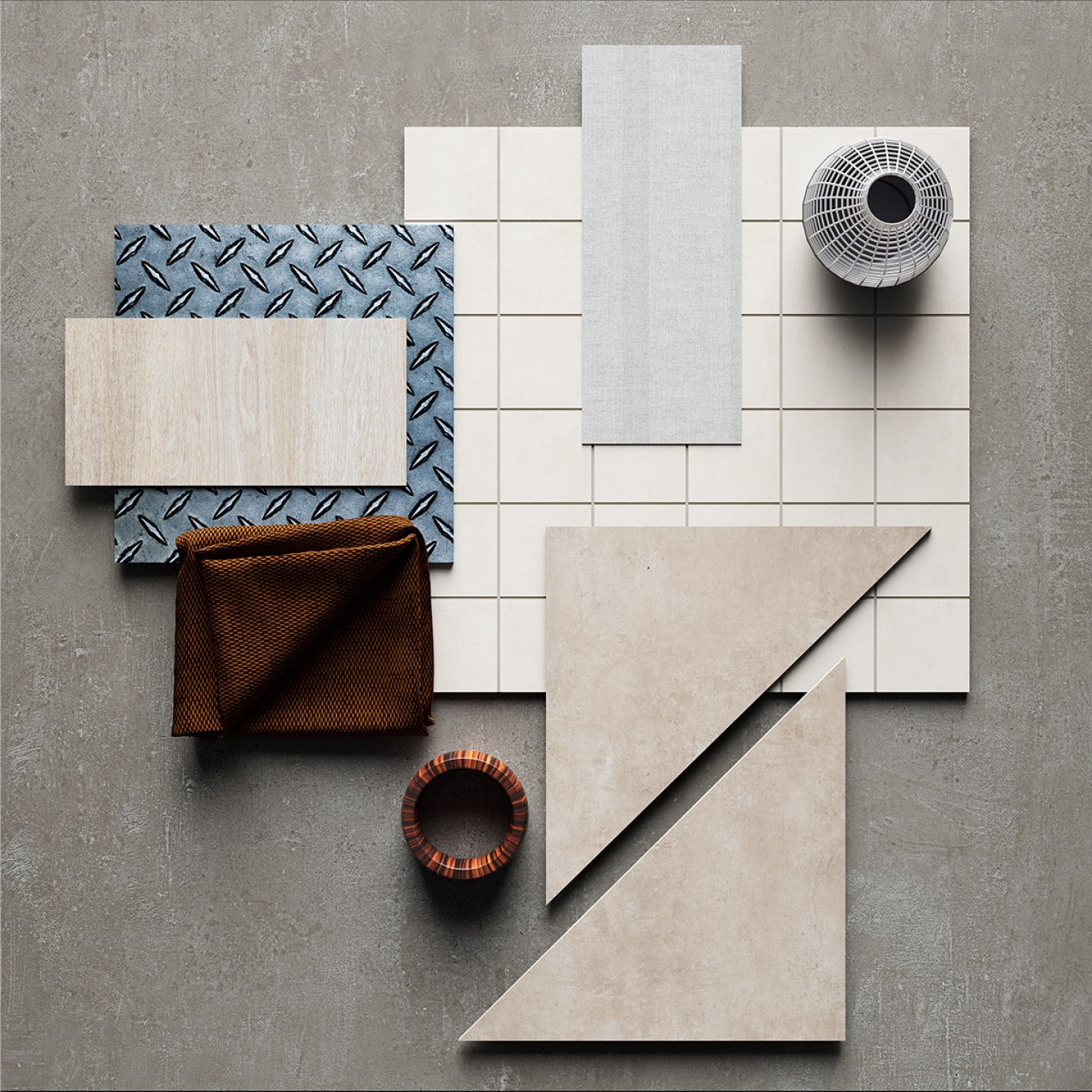 Materialauswahl mit Fliesenmustern in Hell und Dunkel, ergänzt durch Stoffproben.