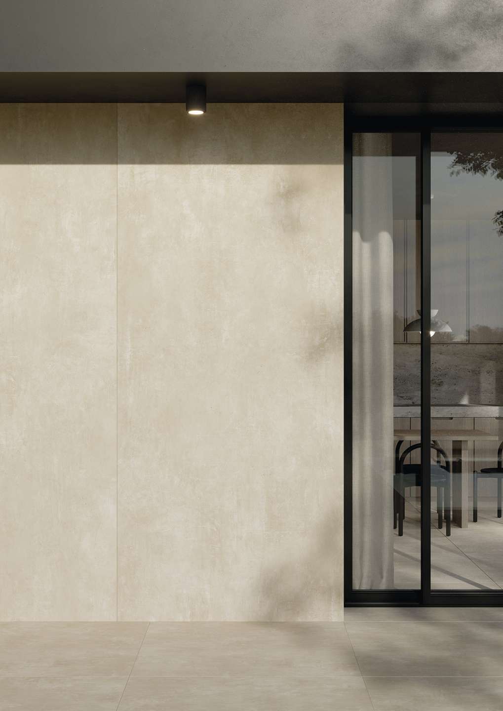 Moderne, helle Porzellanfliesen an Wand und Boden einer Terrasse.