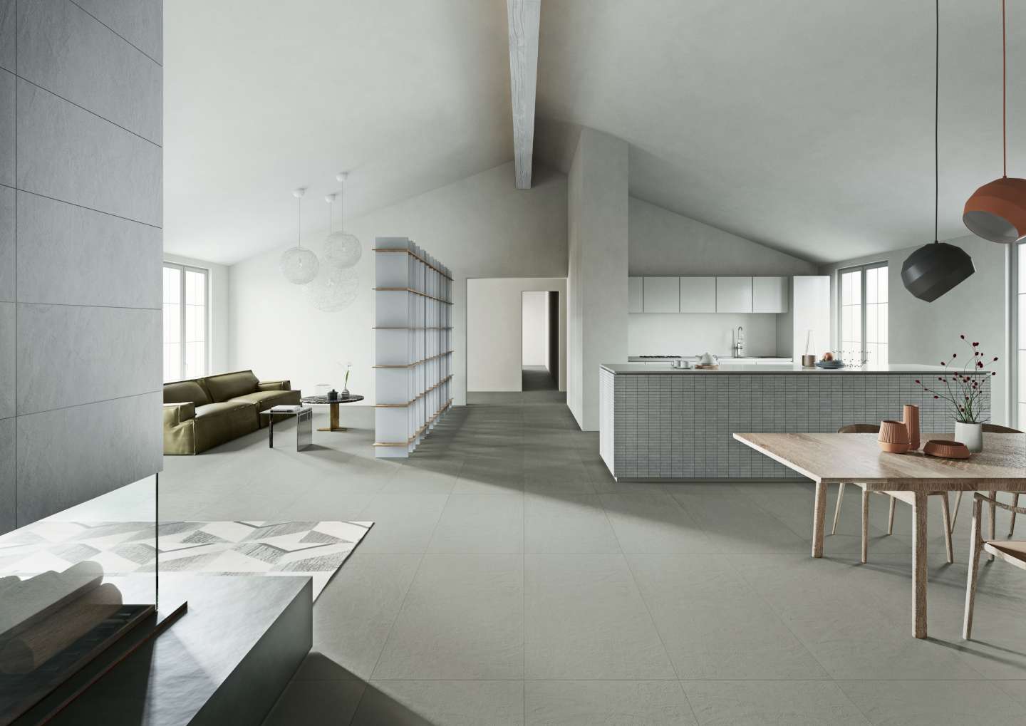 Großformatige, hellgraue Fliesen in einem modernen Wohn- und Küchenbereich.